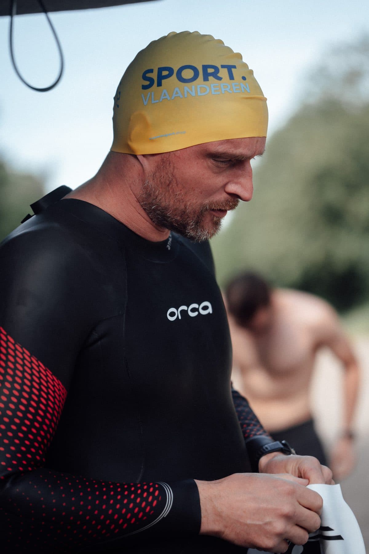 Swimmer in a wetsuit ready for open-water training